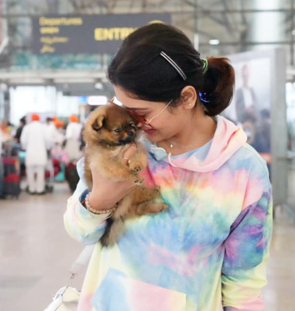 Payal Rajput with her puppy at airport